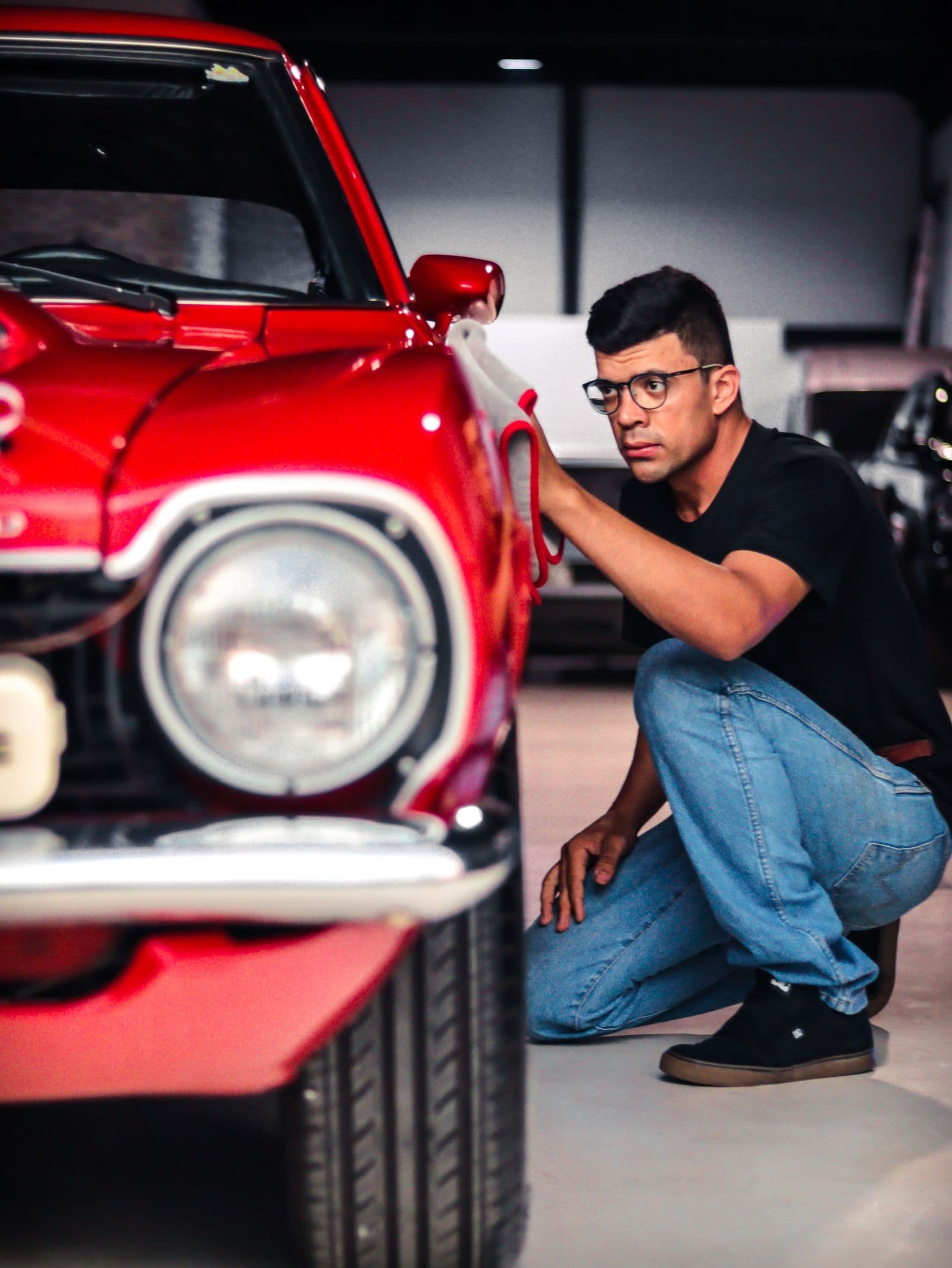 Technician giving a vehicle a final inspection